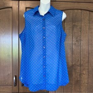 Sheer and flowy blue, pink and white sleeveless blouse.